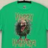 Image of the happy holidays horror turkey t-shirt featuring a very scary turkey wrapped in christmas tinsel, with the words Happy Holidays